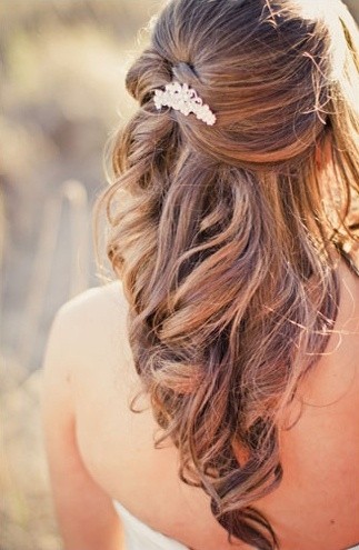Half hairstyles half down for a long -haired wedding ceremony