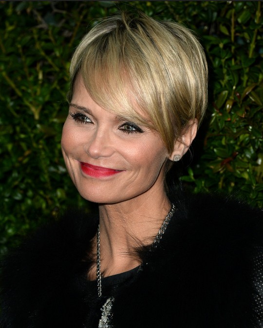A short haircut from Christine Cenoyeh with long side bangs: older hairstyles