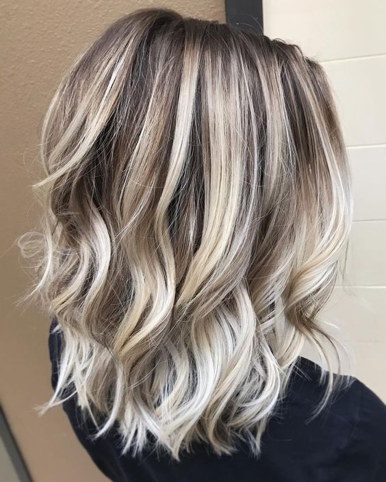 Hairstyles with a wavy layer for women thick hair - medium haircuts in Alta