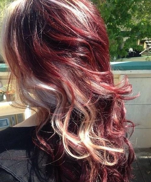 Tight curly hairstyles 2014: Red hair with Ashkar Al -Abarr