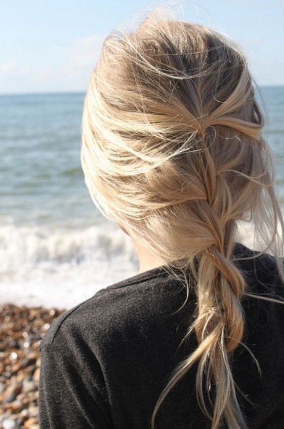 A loose braid, messy: long hair for summer