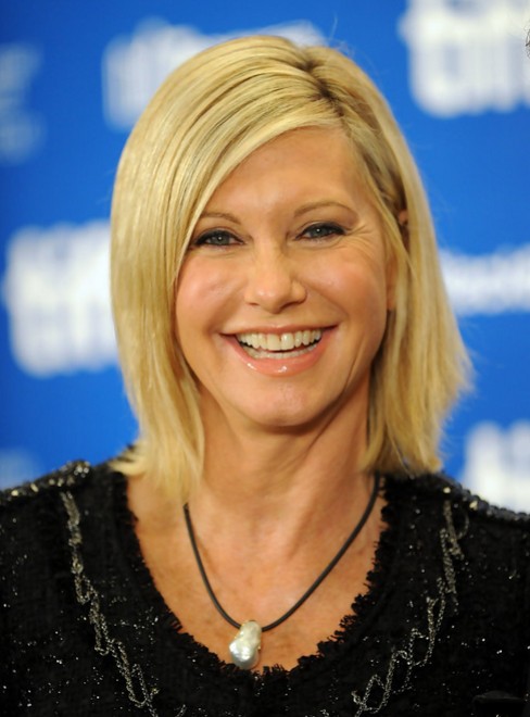 Olivia Newton-John John modern in the side part of poetry