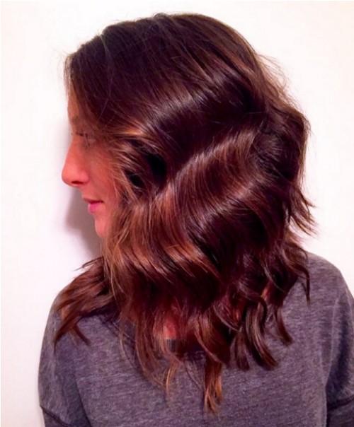 Red, wavy hairstyle