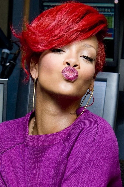 Rihanna short hairstyles: short pink hair with long side bangs