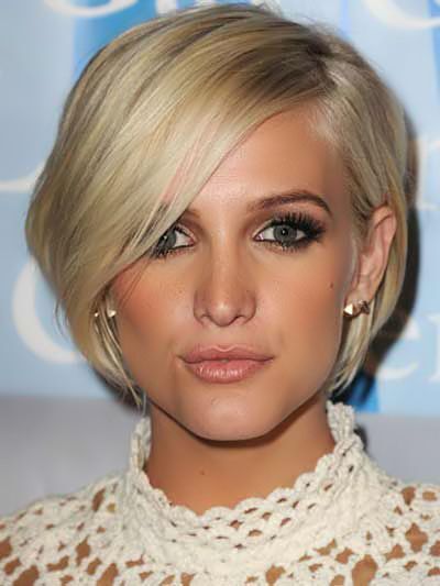 A short haircut with side bangs for women