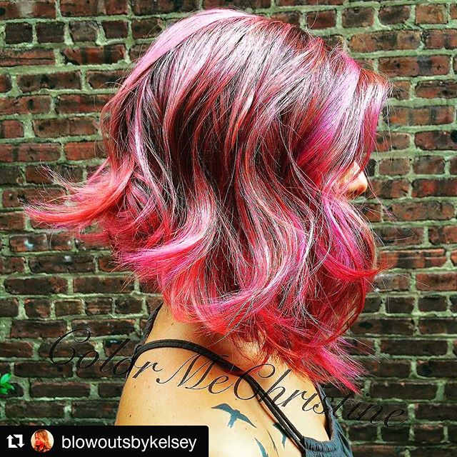 A side view of red red hairdressing red pop pop
