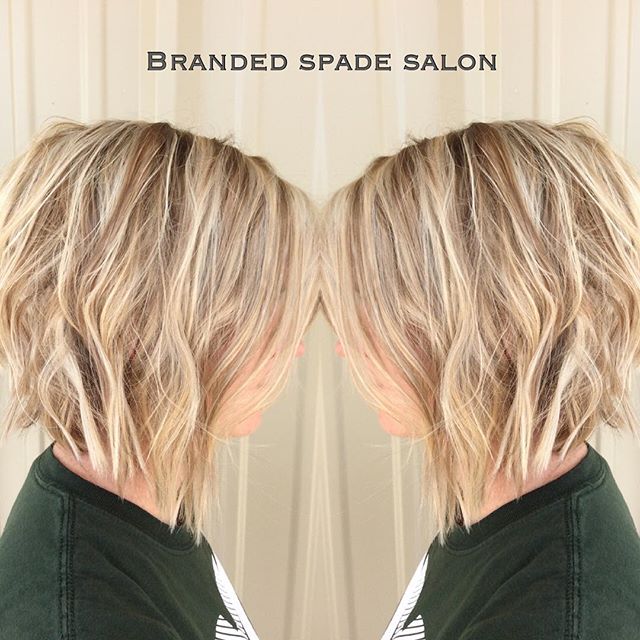 Side view of the blonde short hairstyle Bob Bob