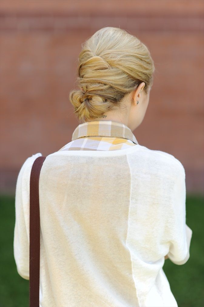 Simple office hairstyles for women: low woven hairstyle