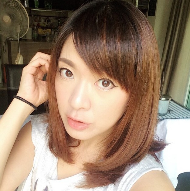 Sweet medium hairstyle omrbe bob with side bangs for Asian girls - Thailand