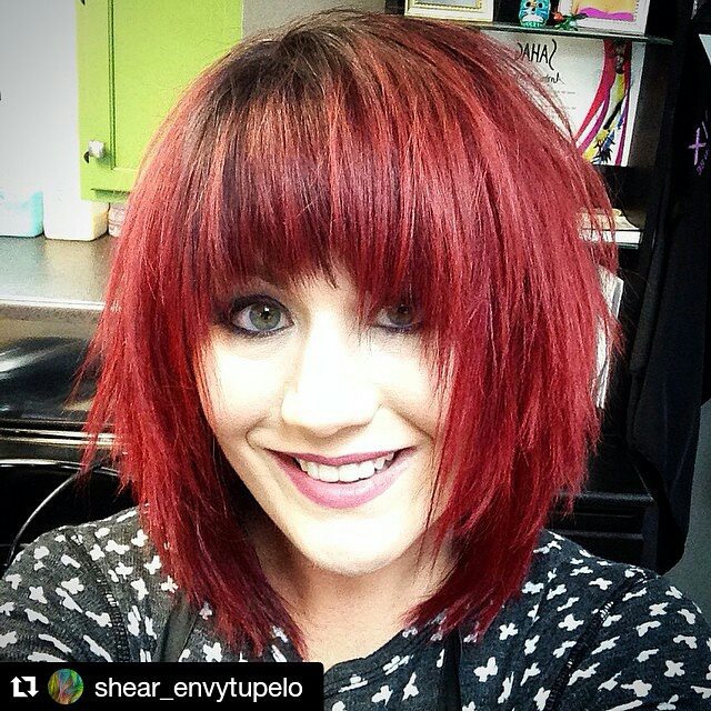 Short red pop hair cut with explosions