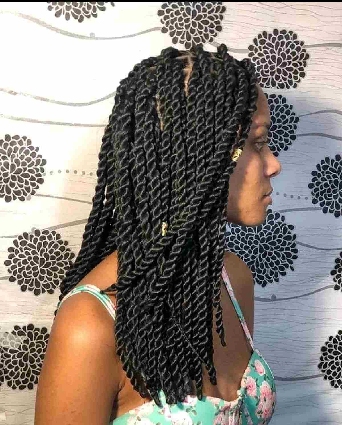 Medium-Length Twist Braids with Gold Cuffs