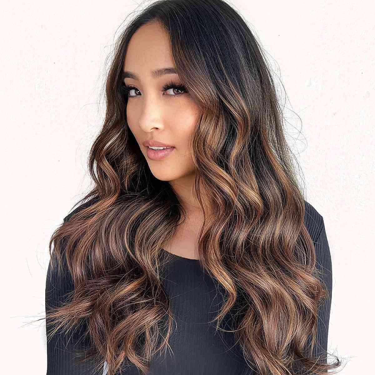 Amazing dark brown hair with caramel highlights