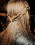 Two fish tail braids, spelling hairstyles at an easy concert