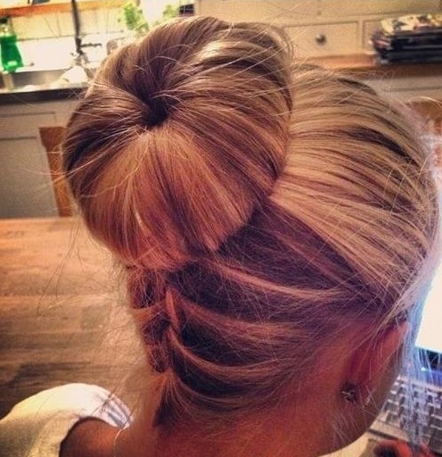 Upside down hairstyle with a hand