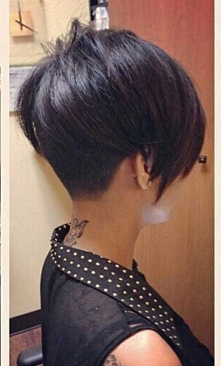 Darkly asymmetric hair styles are very short: a side view