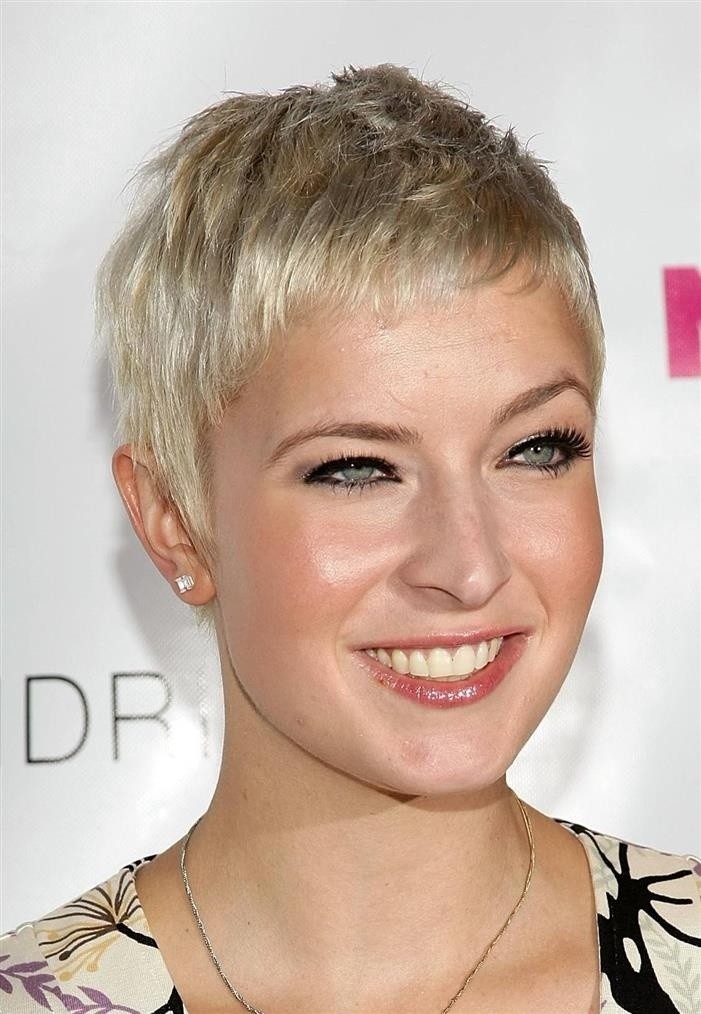 Hair styles are very short: a woman shaving the long face