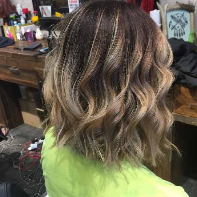A rear view of the moderate chaos bob hairstyle with outstanding points