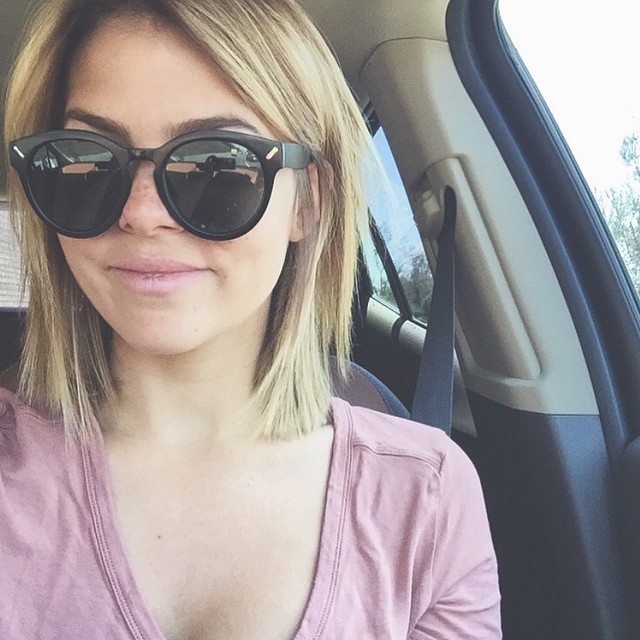 Blonde Planet Bob hairstyle with glasses