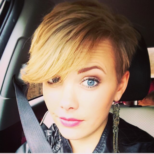 Cutting blonde pieces with long bangs