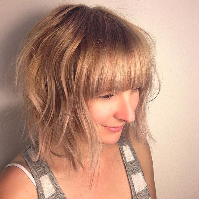 Clean messy barber with sharp bangs