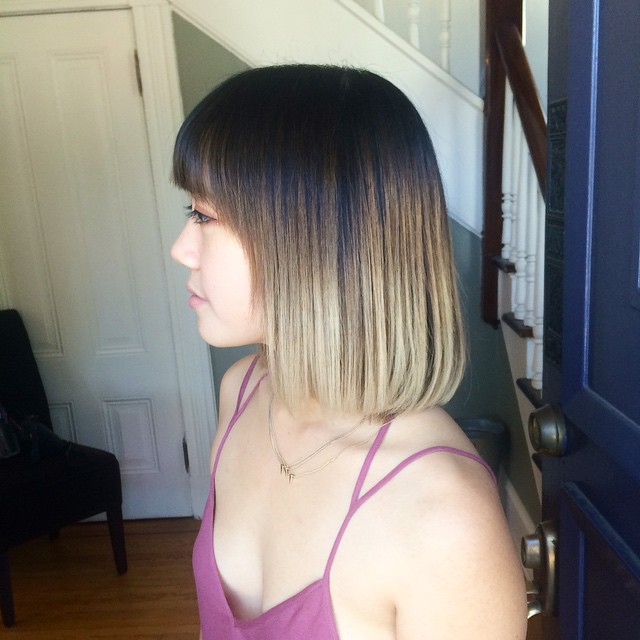 Medium length bob hairstyle with sharp bangs