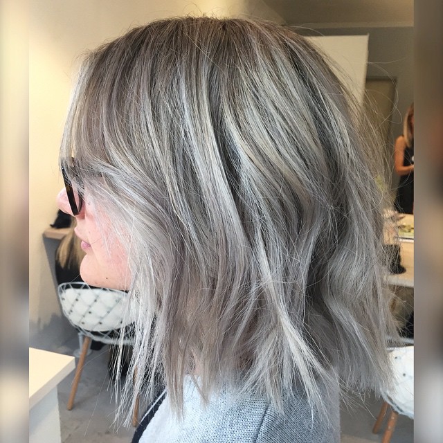 Medium hairstyle is the chaotic layers of thick hair