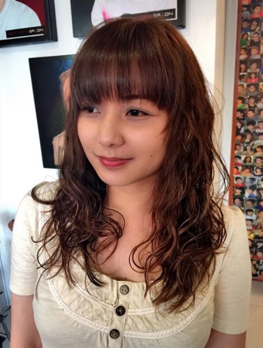 Perms Hairstyles - Long Contribution Hairstyle with Bangs
