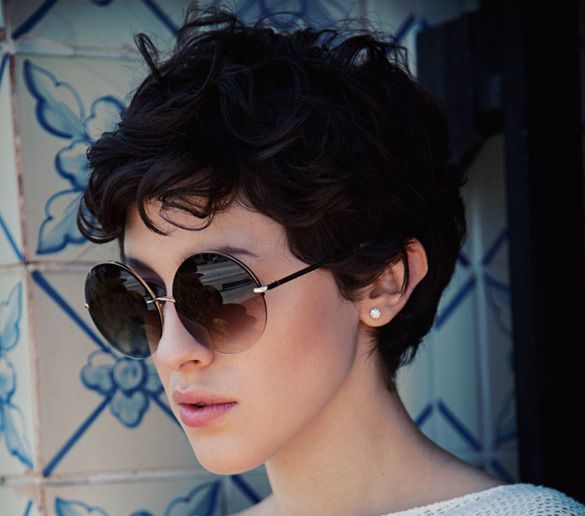 Short black curly frizzy cut