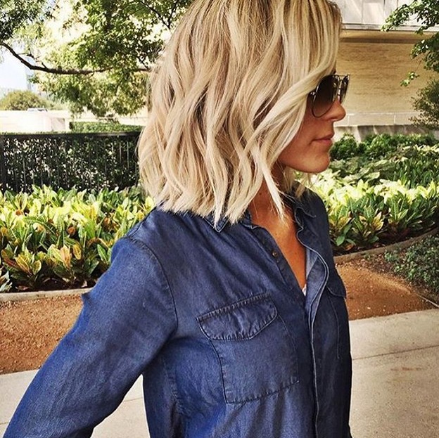 Flaving blonde hairstyle Bob with glasses