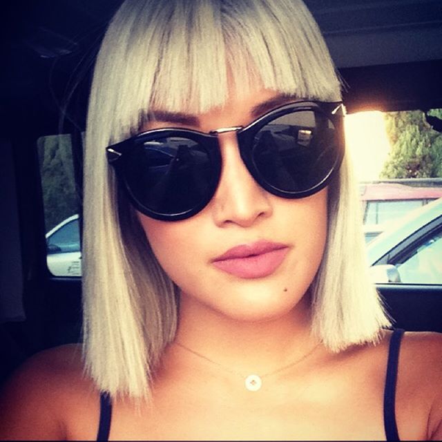 Modern Blond Planet Pop cut with sunglasses
