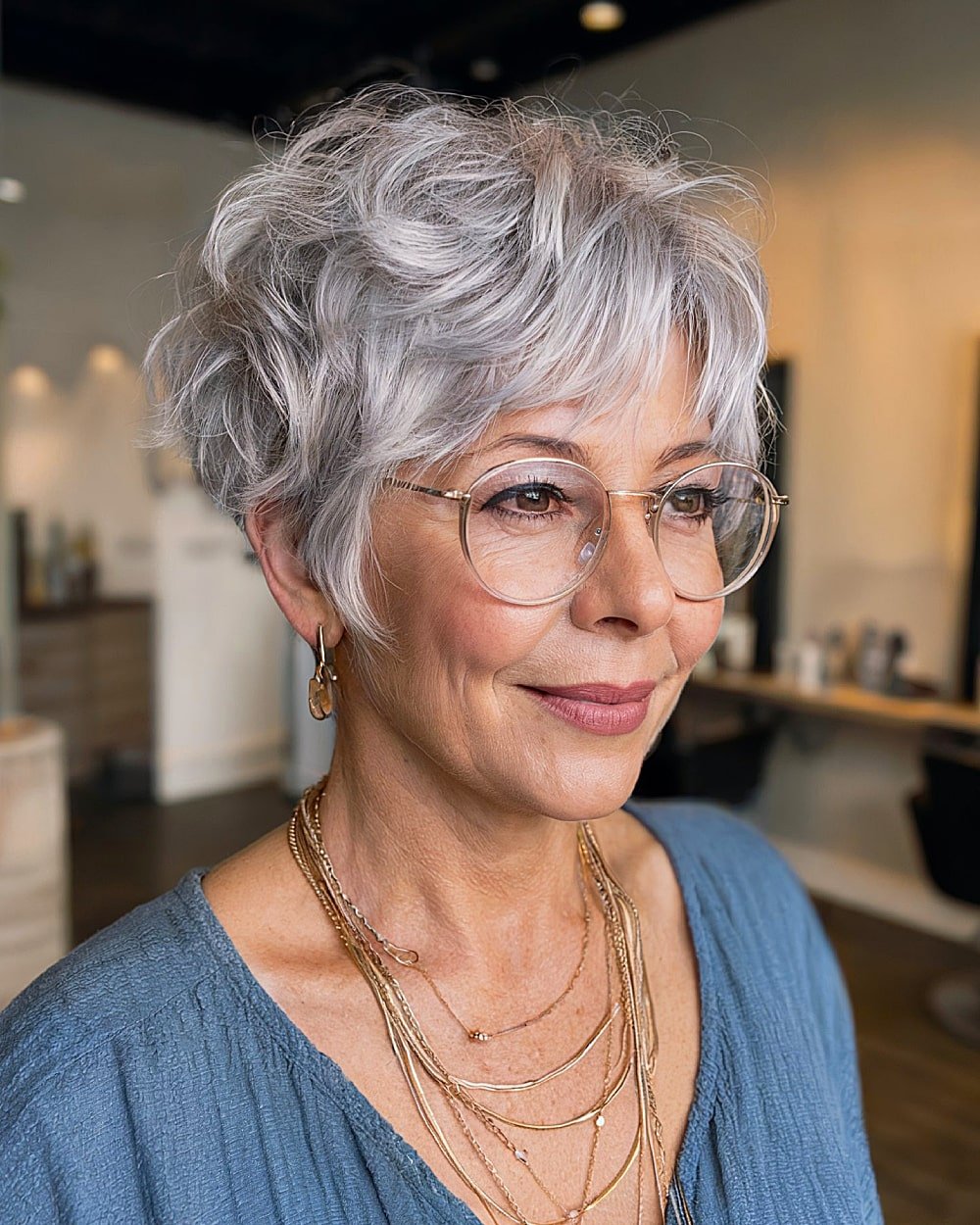 Pixie cut with soft waves for women with gray hair over 60, a lightweight and voluminous style