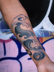 Wave Tattoos: Symbols of Strength, Flow, and Connection to the Ocean