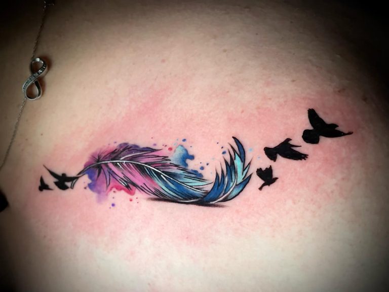 Watercolor Feather Tattoos: Light, Colorful, and Full of Meaning