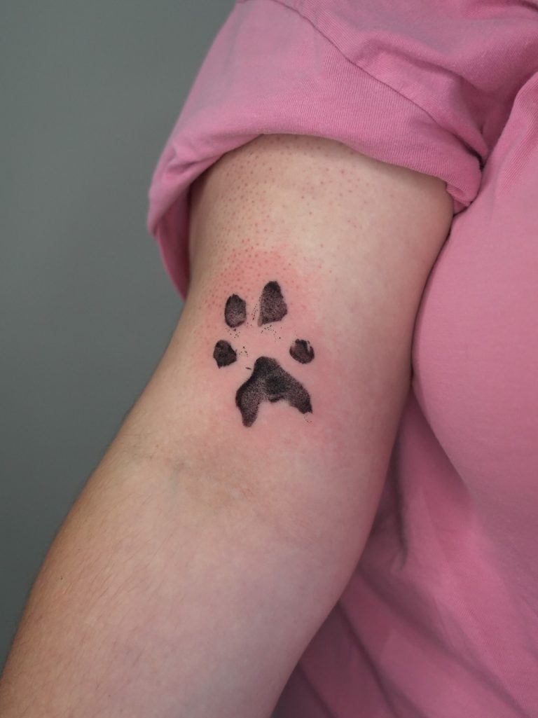 Paw Print Tattoos: A Tribute to Loyalty, Love, and Companionship
