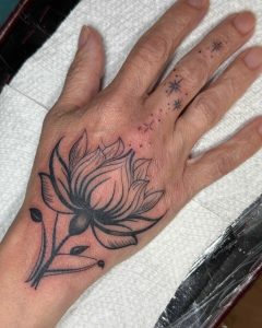 The Spiritual Beauty of Lotus Flower Tattoos: Growth, Purity, and Enlightenment