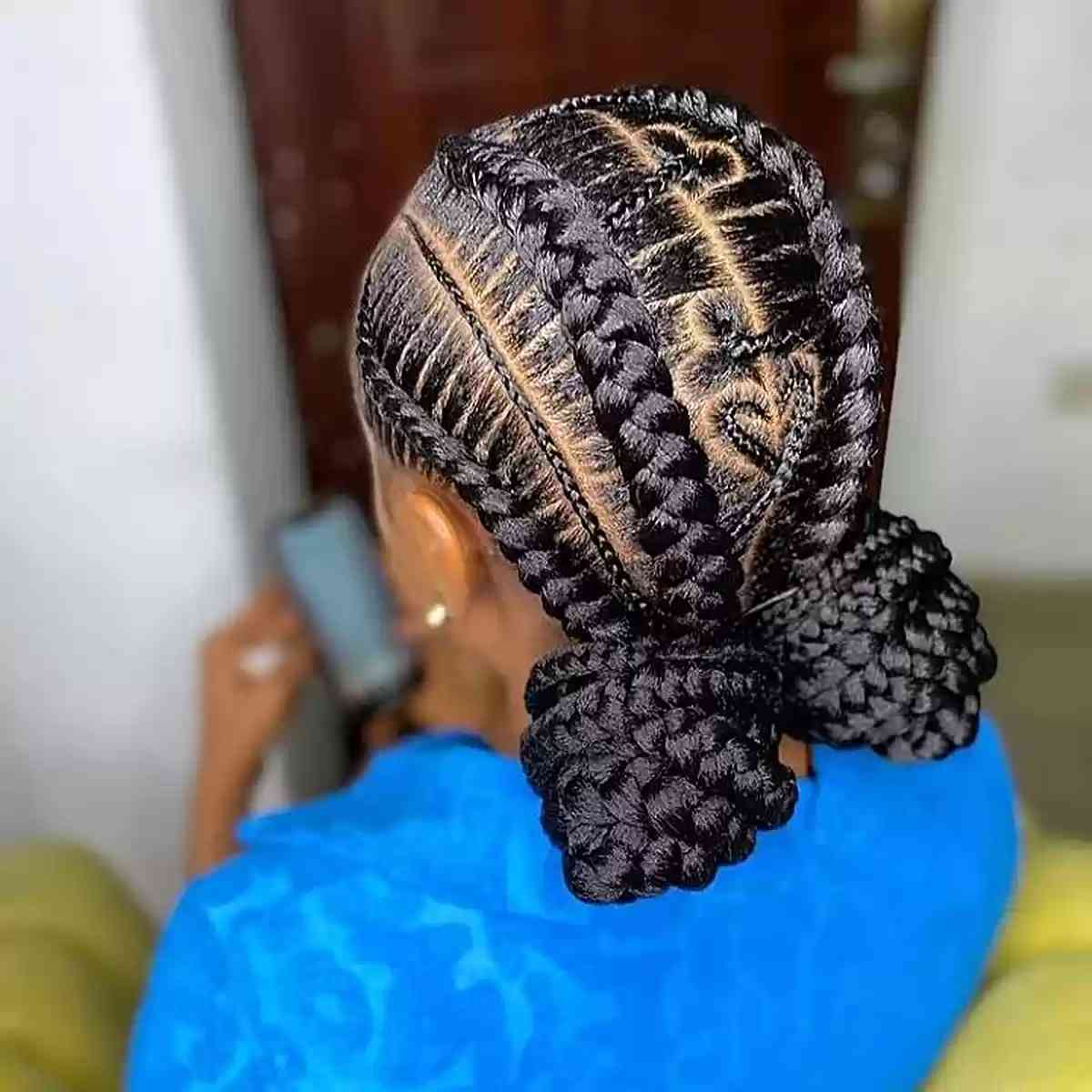 Big braids with low space buns