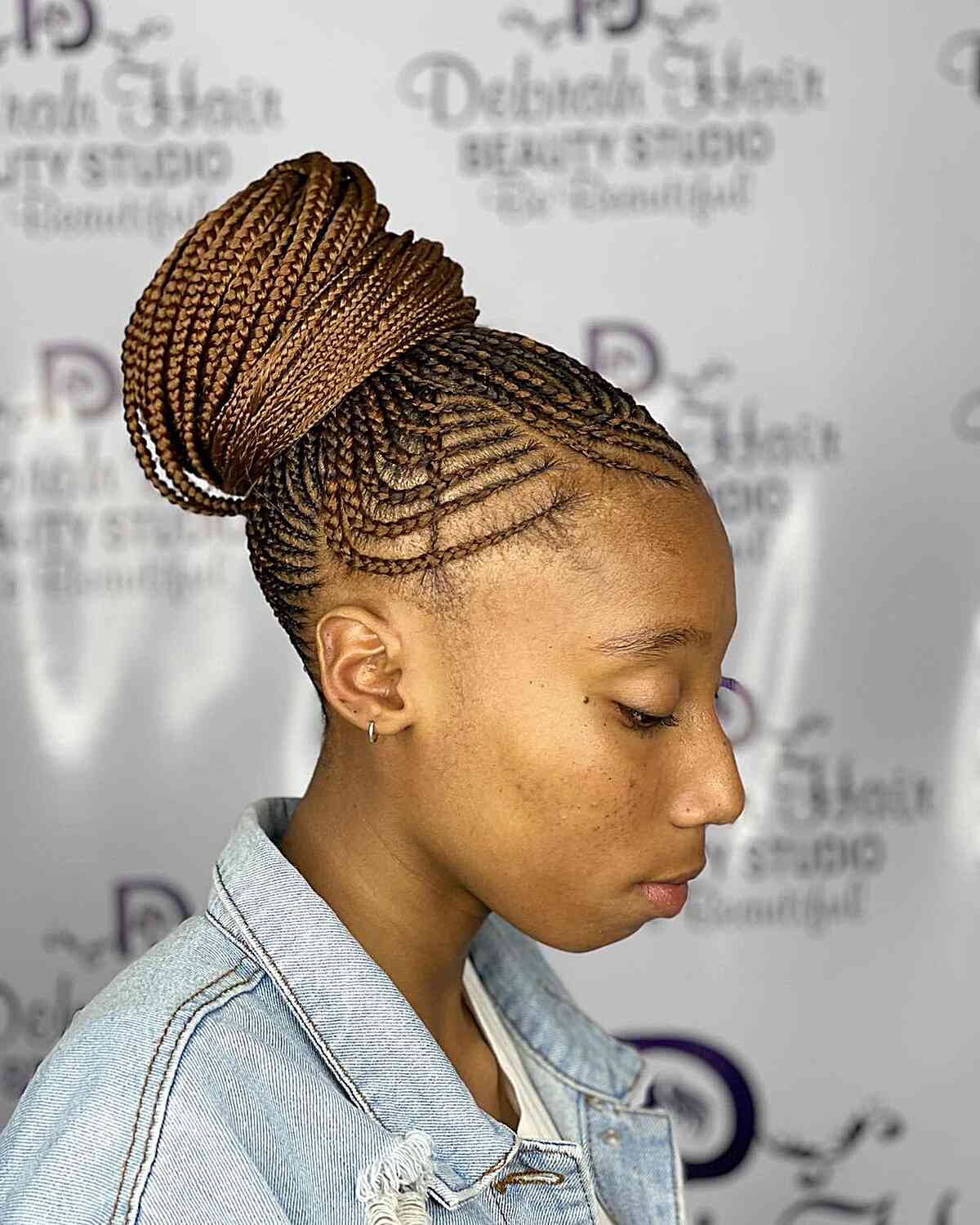 Braided brown bun with cornrows