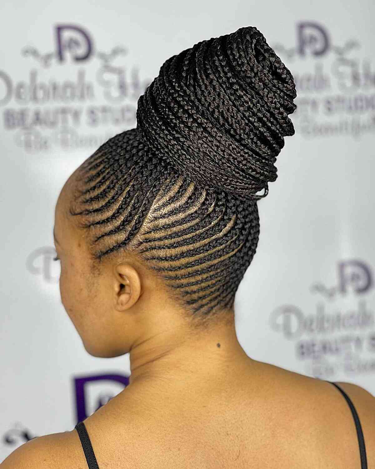 A big, high bun for very long braids