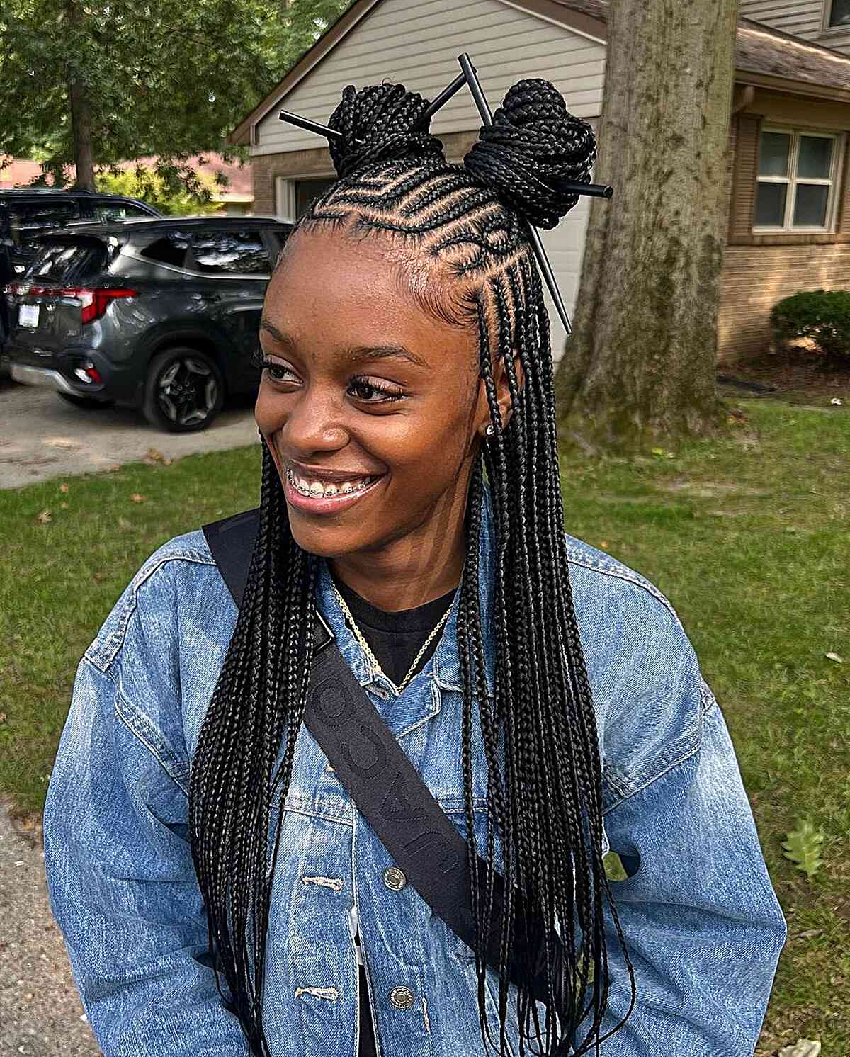 Half long hair with Fulani braids and buns