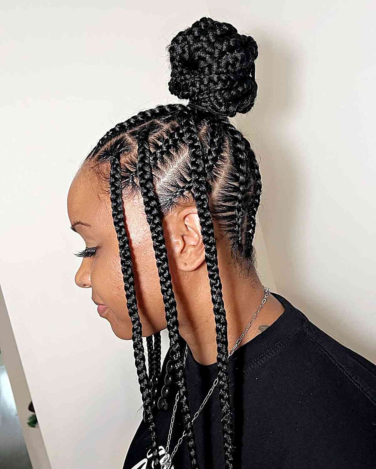 Chunky braids updo bun