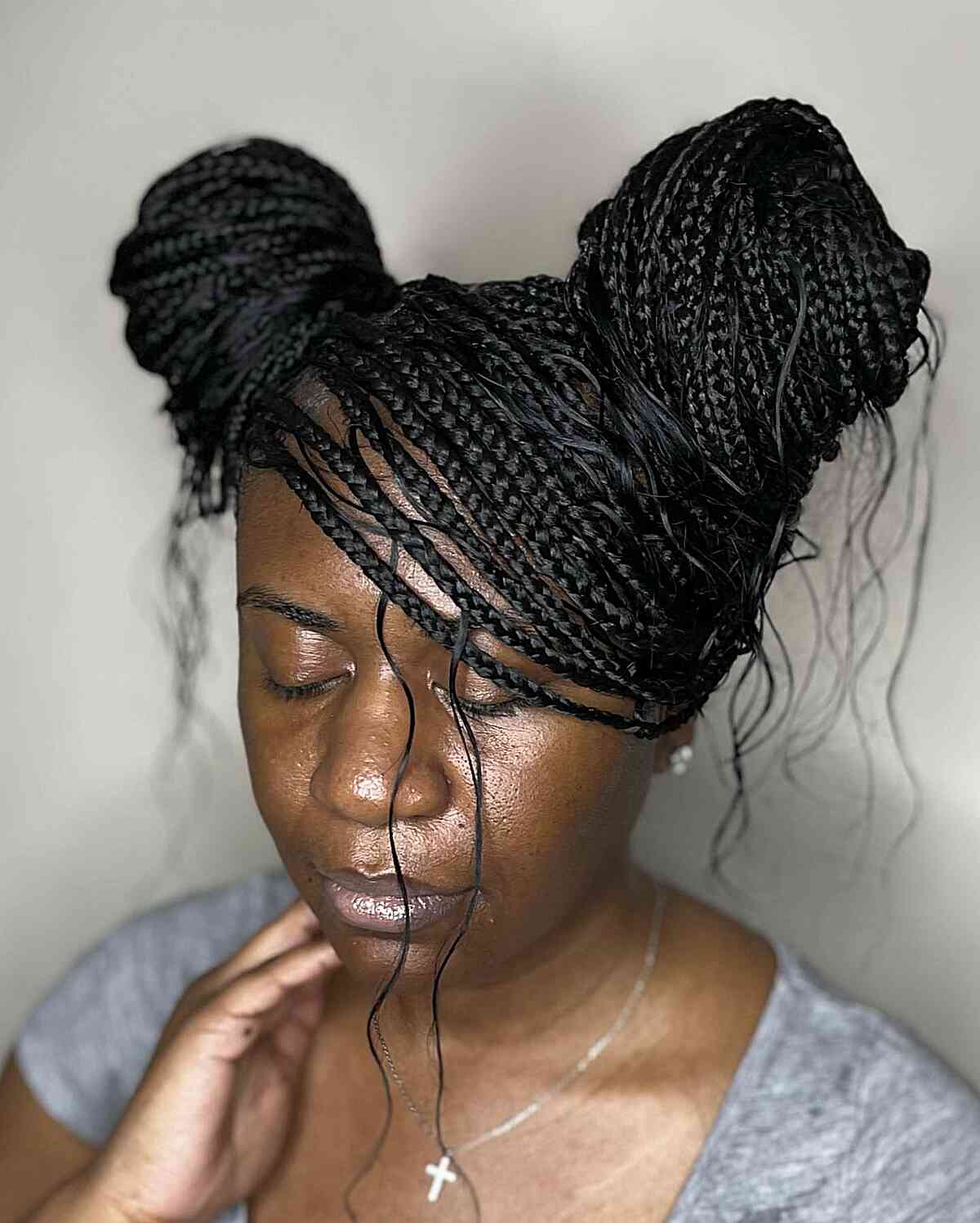 Side braided updo with space buns