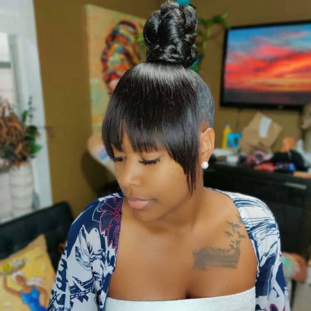 Braided bun with bangs for black women