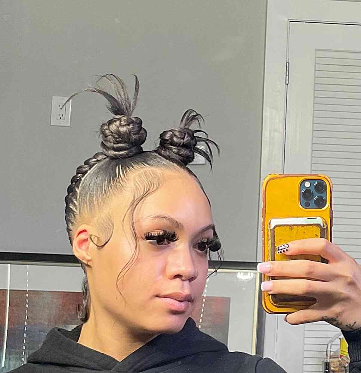 Inverted braids with spiky buns