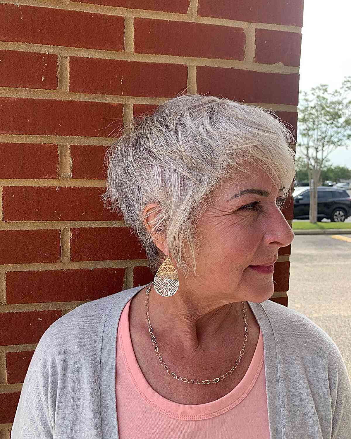 Soft and messy haircut for 60 year old women with fine hair