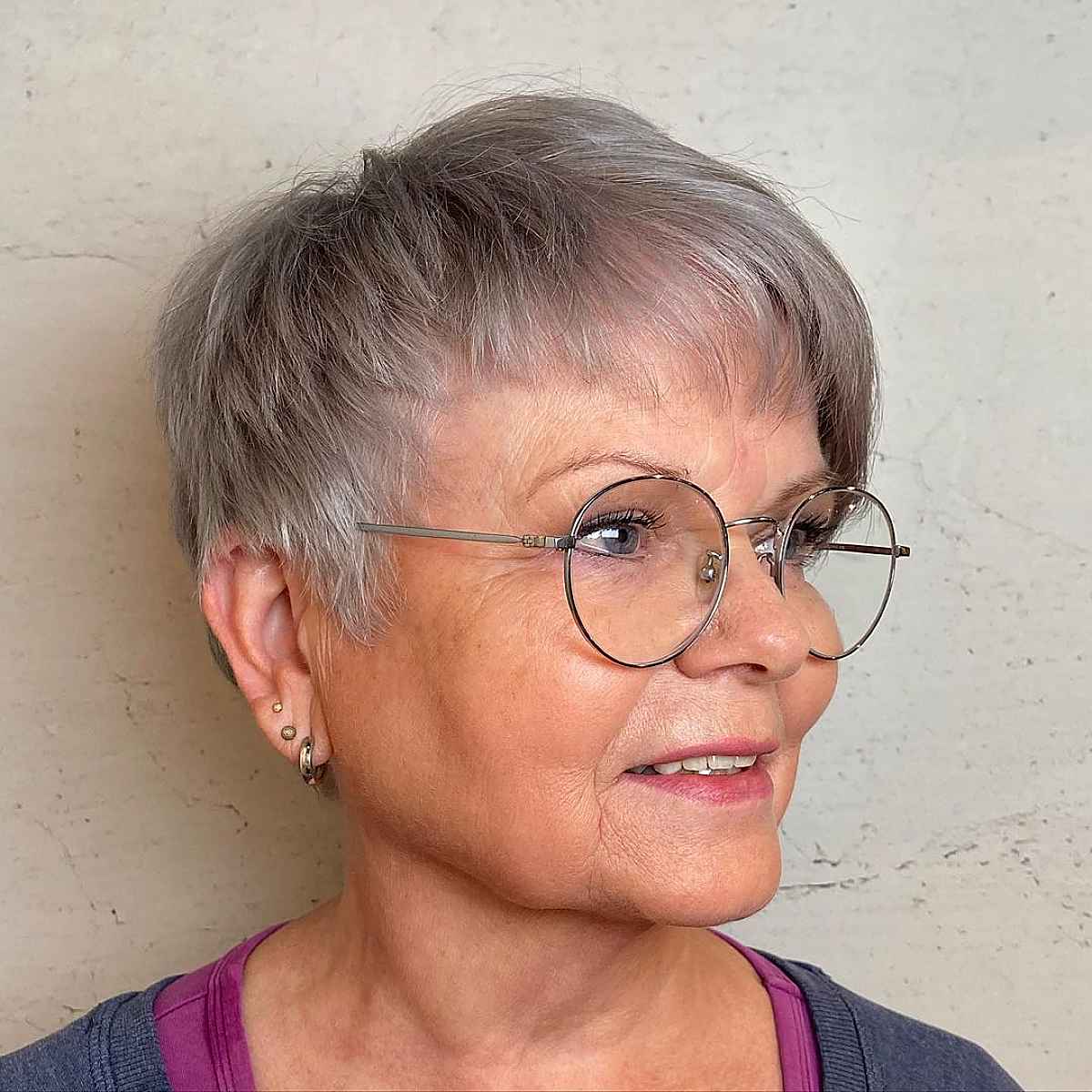 Gray pixie hair with asymmetrical bangs