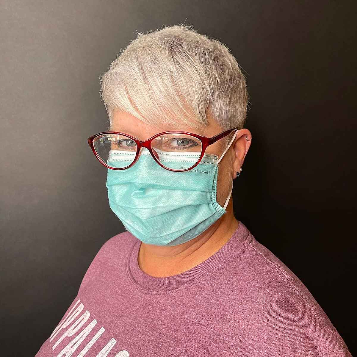 Classic pixie with side bangs on mature women