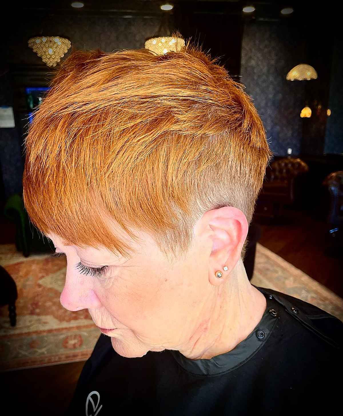 Copper pixie hair with layers and bangs