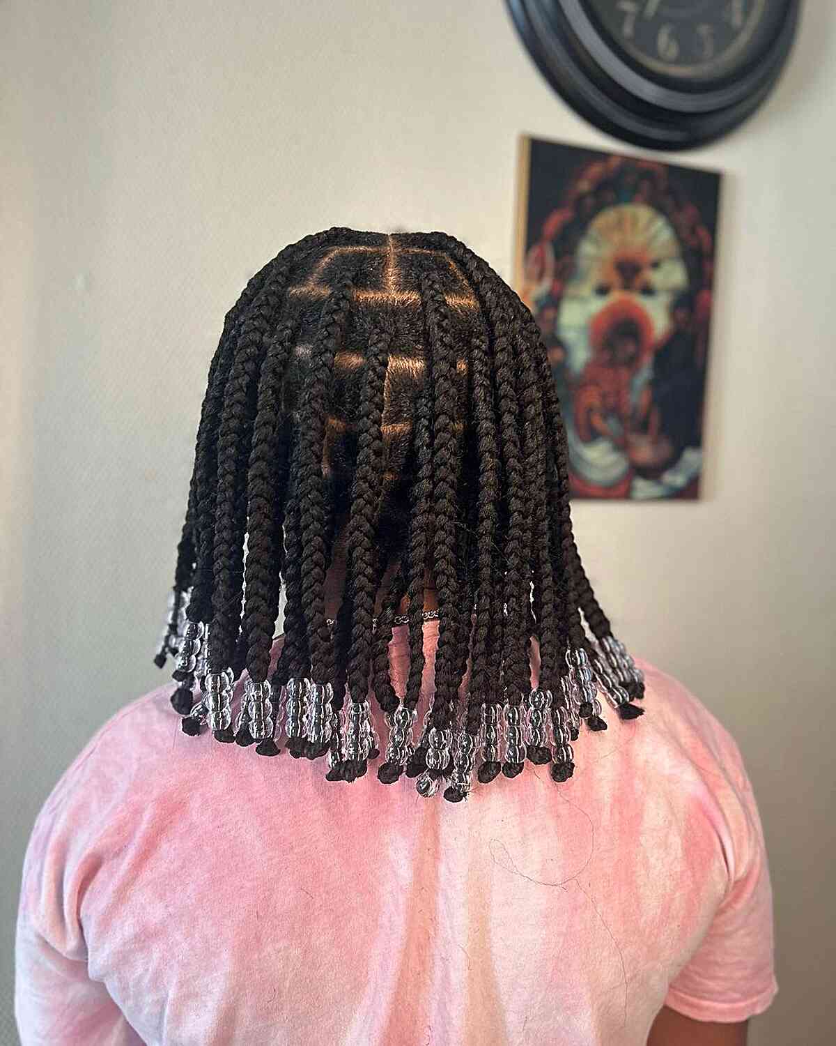Medium sized knotless shoulder length braids with clear beads