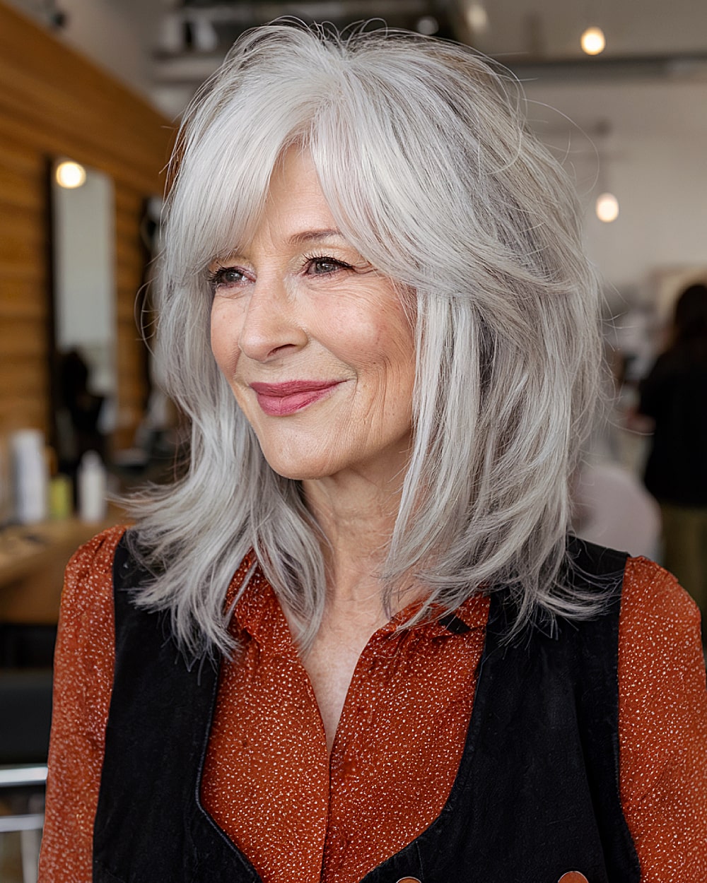 Medium length layered haircut for thick silver hair over 60