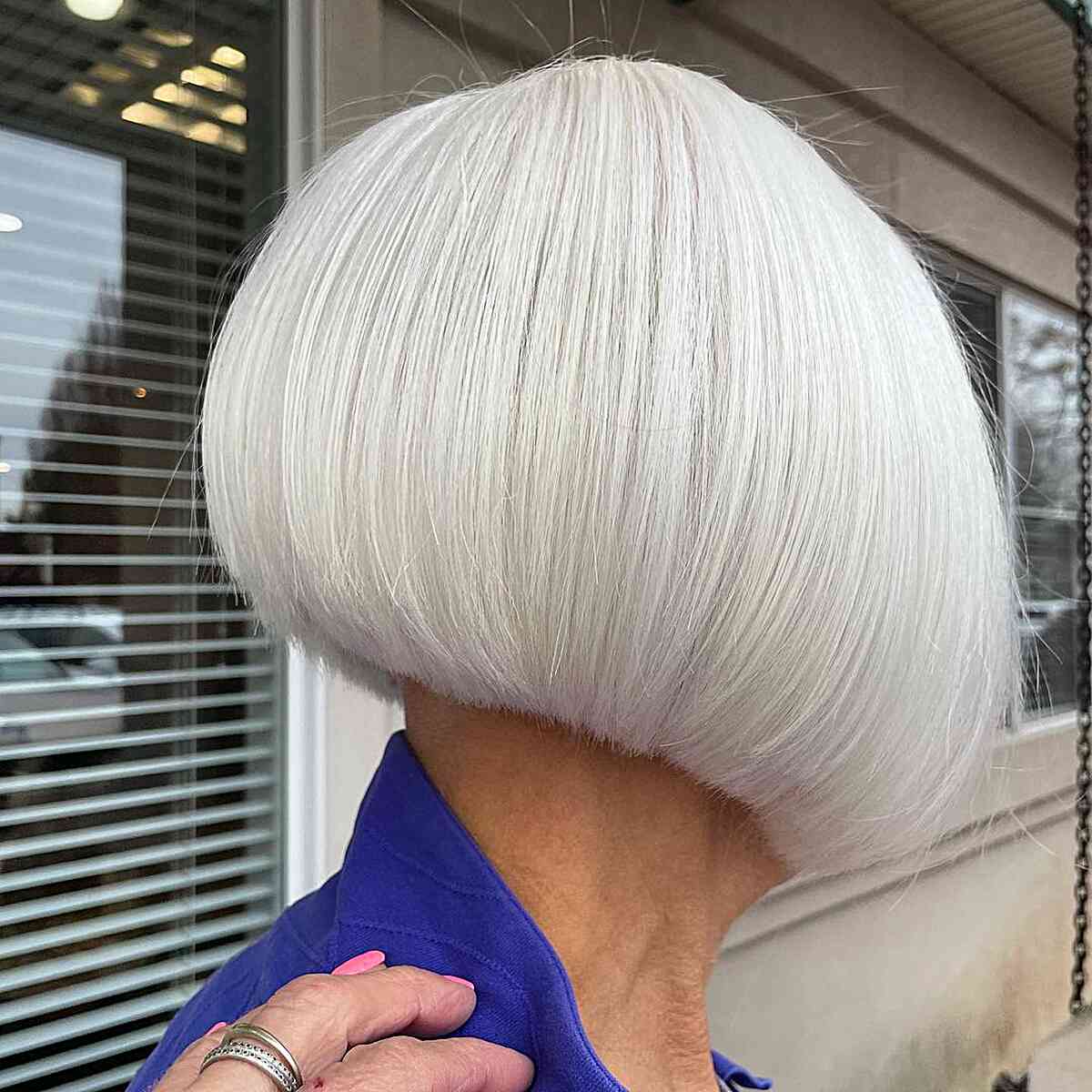 White blonde on a sharp concave thick bob for ladies aged 60 and over